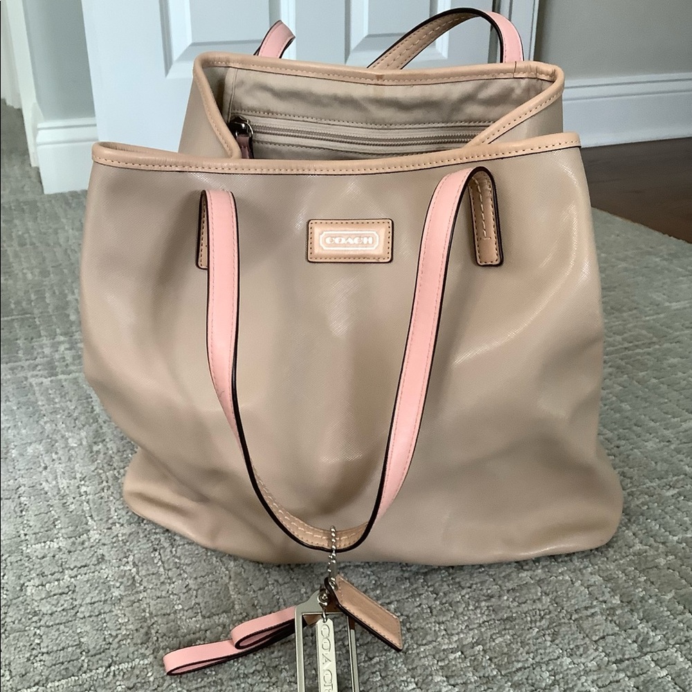 Coach tote. Tan leather.  Holds everything!!